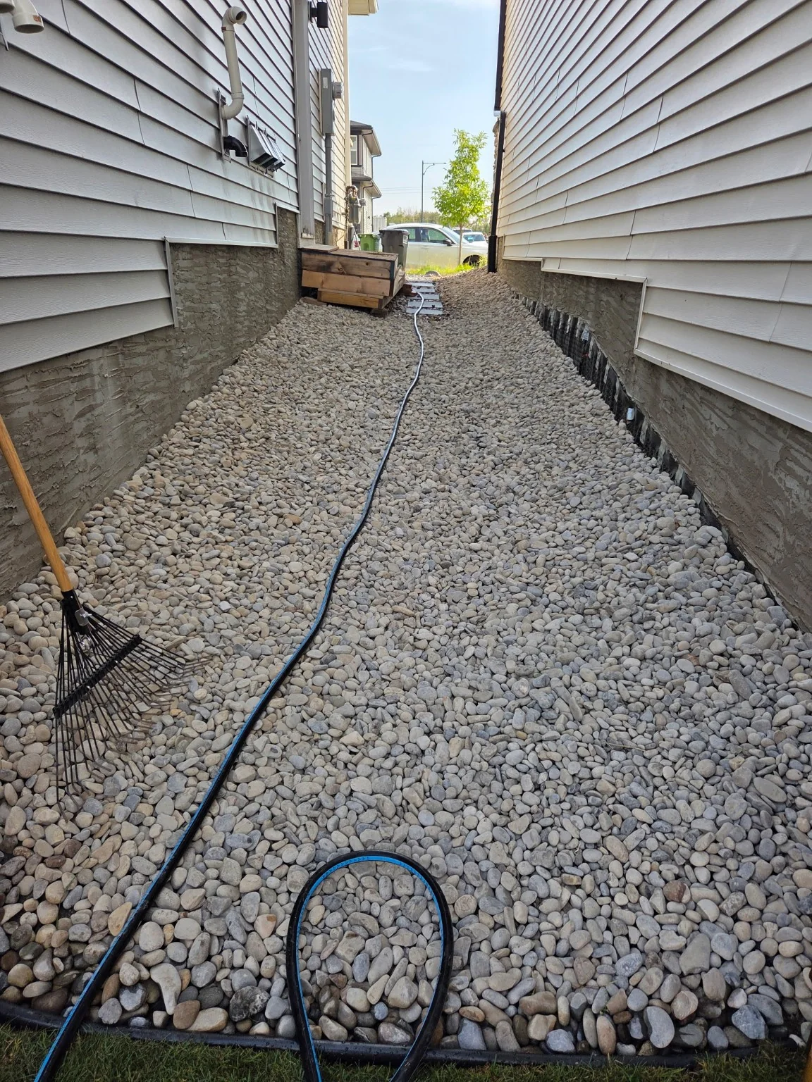 Completed side yard with river rock